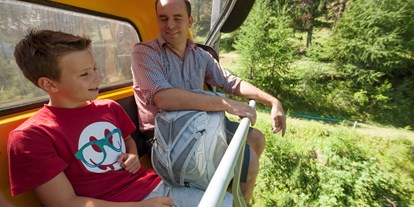 Ausflug mit Kindern - Trentino-Südtirol - Mit dem Sessellift von der Tatstation auf die Bergstation am Watles - Erlebnisberg Watles