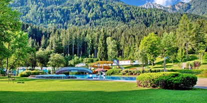 Ausflug mit Kindern - Bad: Freibad - Großzügig angelegtes Freibad mit drei Schwimmbecken, großer Liegewiese und Restaurant - Waldbad Dellach im Drautal