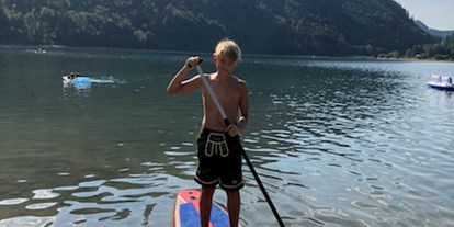 Ausflug mit Kindern - Salzburger Seenland - Stand Up Paddel Kurse für die ganze Familie