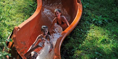 Ausflug mit Kindern - Tirol - 66m-Wasserrutsche "Happy Swing" - Ferienparadies Natterer See